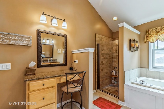 2107 Lawson Blvd, Gurnee, IL 60031 - bathroom with vanity, a bath, vaulted ceiling, and a shower stall
