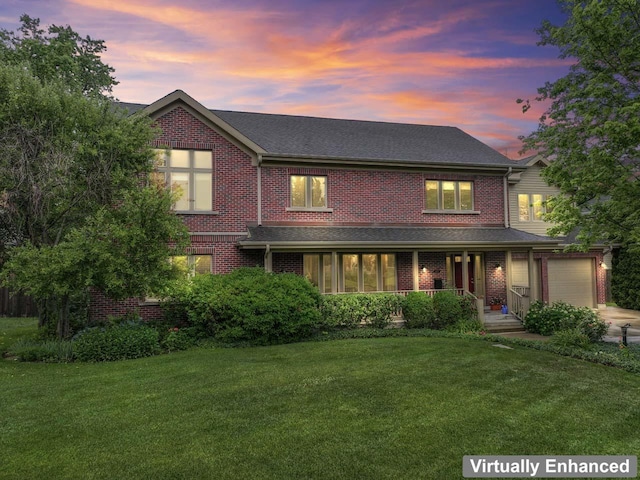 860 Kenton Rd, Deerfield, IL 60015 - view of front of property featuring a porch, a garage, brick siding, and a front lawn