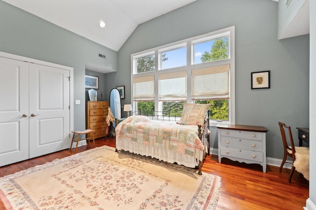 860 Kenton Rd, Deerfield, IL 60015 - bedroom with wood finished floors, high vaulted ceiling, a closet, and recessed lighting