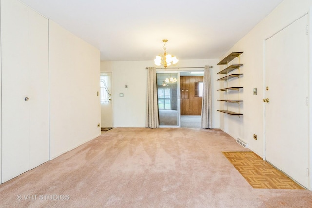 14937 Highland Ave, Orland Park, IL 60462 - spare room with a chandelier and carpet flooring