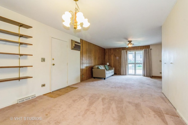14937 Highland Ave, Orland Park, IL 60462 - unfurnished room featuring carpet, a chandelier, a ceiling fan, and an AC wall unit