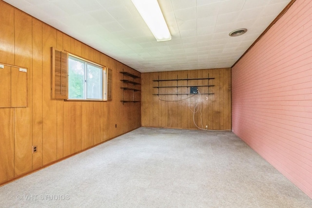 14937 Highland Ave, Orland Park, IL 60462 - empty room featuring wooden walls and light colored carpet