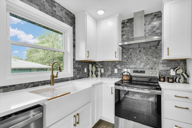 1801 Cindy Lynn St, Urbana, IL 61802 - kitchen featuring stainless steel appliances, wall chimney exhaust hood, and white cabinets