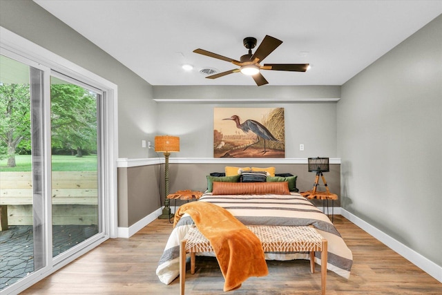 1801 Cindy Lynn St, Urbana, IL 61802 - bedroom with access to outside, wood finished floors, and baseboards