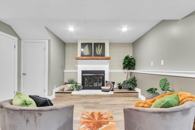 1801 Cindy Lynn St, Urbana, IL 61802 - living area featuring wood finished floors, baseboards, and a fireplace