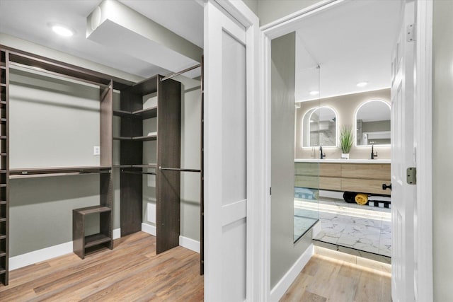 1801 Cindy Lynn St, Urbana, IL 61802 - walk in closet with wood finished floors