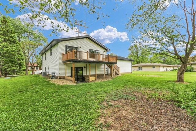 1801 Cindy Lynn St, Urbana, IL 61802 - back of house with a wooden deck, stairs, a yard, and cooling unit