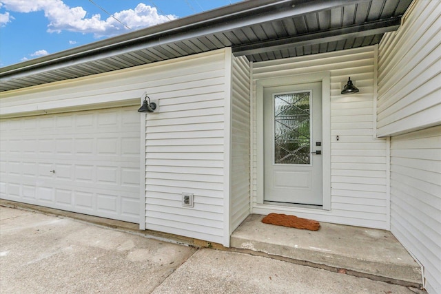 1801 Cindy Lynn St, Urbana, IL 61802 - property entrance featuring a garage and concrete driveway