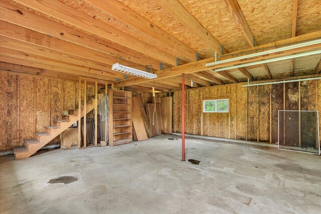 1801 Cindy Lynn St, Urbana, IL 61802 - misc room with unfinished concrete floors and stairs