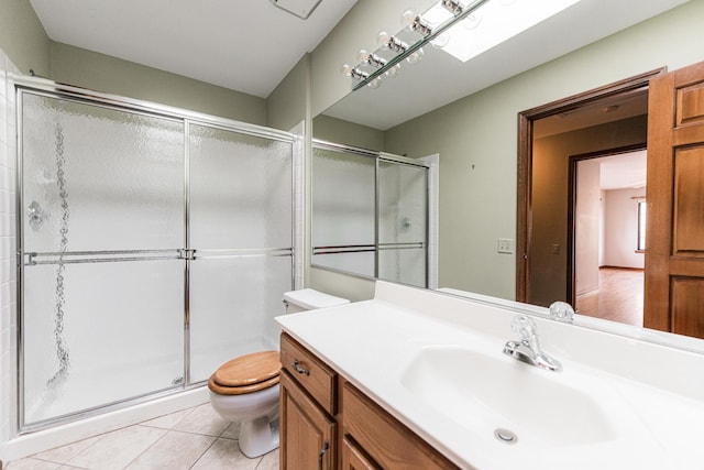 full bathroom with toilet, tile patterned floors, a shower stall, and vanity