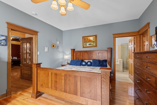 bedroom with light wood-type flooring and ceiling fan
