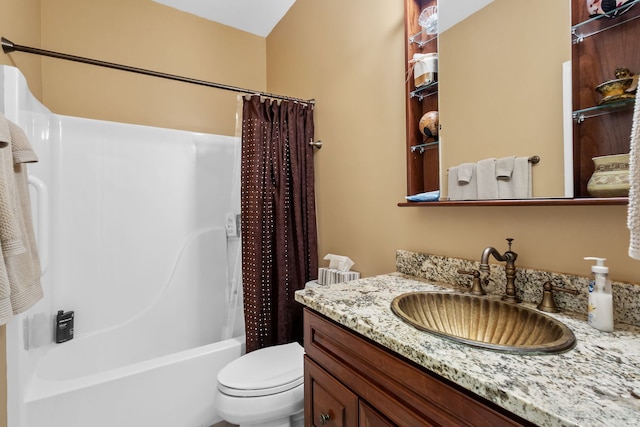 bathroom featuring vanity, toilet, and shower / tub combo with curtain