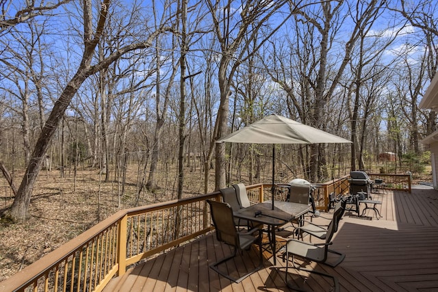 deck featuring outdoor dining space