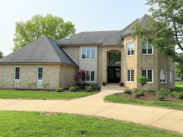 87 Windmill Rd, Orland Park, IL 60467 - french provincial home featuring french doors, brick siding, and a shingled roof