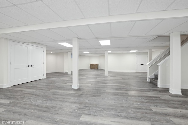 87 Windmill Rd, Orland Park, IL 60467 - finished below grade area with wood finished floors, baseboards, and stairway