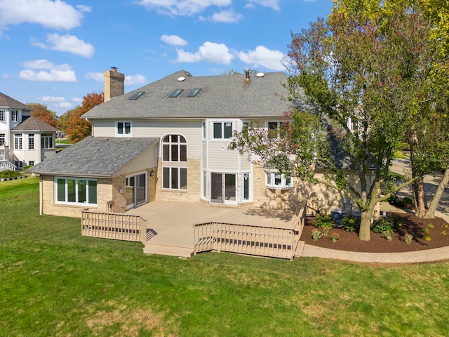 87 Windmill Rd, Orland Park, IL 60467 - back of house featuring a chimney, a shingled roof, a patio area, brick siding, and a lawn
