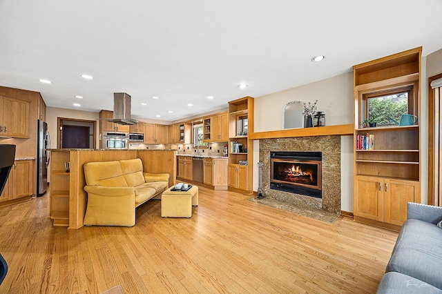 2111 Belleau Woods Ct, Wheaton, IL 60189 - living room with a fireplace, a wealth of natural light, and light wood-type flooring
