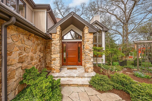 2111 Belleau Woods Ct, Wheaton, IL 60189 - doorway to property with fence and stone siding