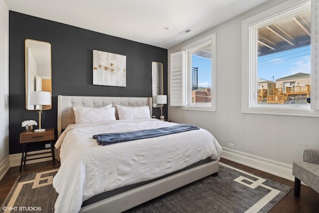 1448 W Chestnut St Unit 2, Chicago, IL 60642 - bedroom featuring baseboards, wood finished floors, and visible vents