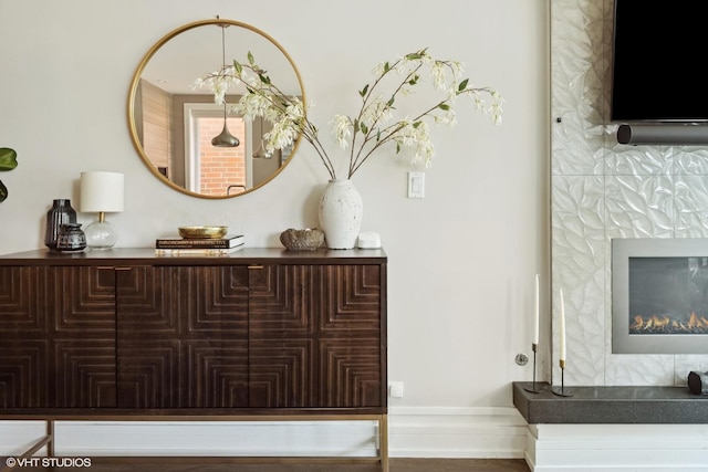 1448 W Chestnut St Unit 2, Chicago, IL 60642 - room details featuring baseboards and a premium fireplace