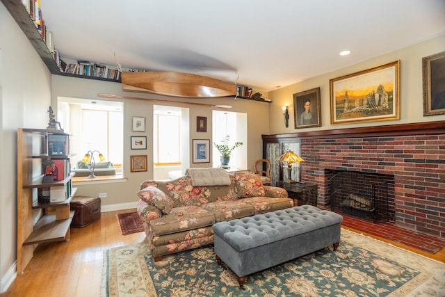 4432 N Racine Ave Unit 3S, Chicago, IL 60640 - living room featuring recessed lighting, baseboards, a fireplace, and hardwood / wood-style flooring