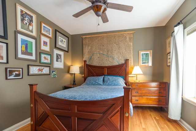 4432 N Racine Ave Unit 3S, Chicago, IL 60640 - bedroom featuring baseboards, multiple windows, and light wood-type flooring