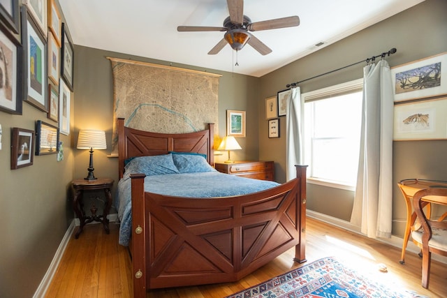 4432 N Racine Ave Unit 3S, Chicago, IL 60640 - bedroom featuring ceiling fan, baseboards, and light wood-style floors