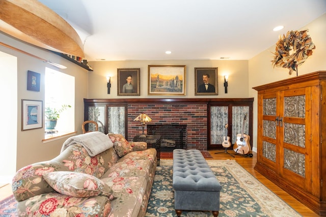 4432 N Racine Ave Unit 3S, Chicago, IL 60640 - living room with a fireplace, recessed lighting, and wood finished floors
