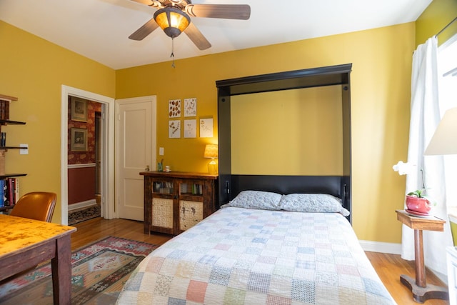 4432 N Racine Ave Unit 3S, Chicago, IL 60640 - bedroom with wood finished floors, baseboards, and ceiling fan
