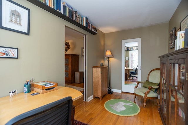 4432 N Racine Ave Unit 3S, Chicago, IL 60640 - sitting room with baseboards and wood finished floors