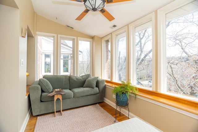 4432 N Racine Ave Unit 3S, Chicago, IL 60640 - sunroom / solarium featuring baseboards, visible vents, wood finished floors, and lofted ceiling