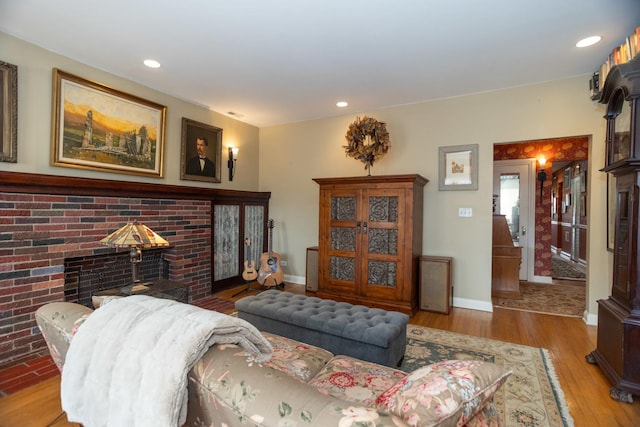4432 N Racine Ave Unit 3S, Chicago, IL 60640 - living area with baseboards, a fireplace, recessed lighting, and wood finished floors