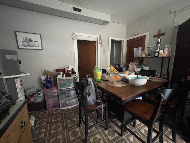 dining space with visible vents