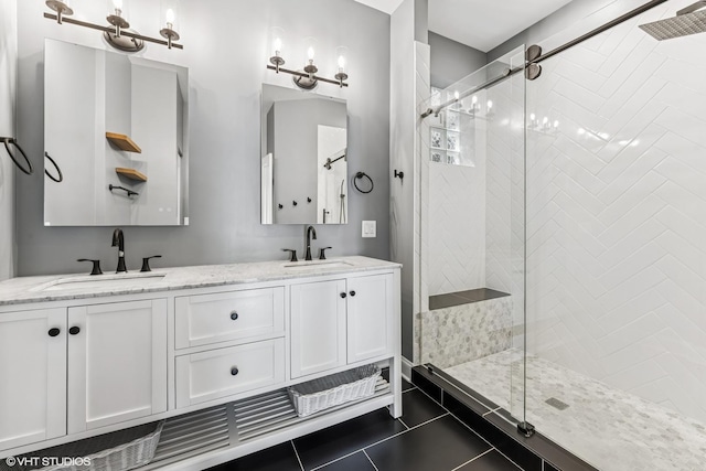 2259 W Wabansia Ave Unit 309, Chicago, IL 60647 - full bathroom with a stall shower, double vanity, and tile patterned floors