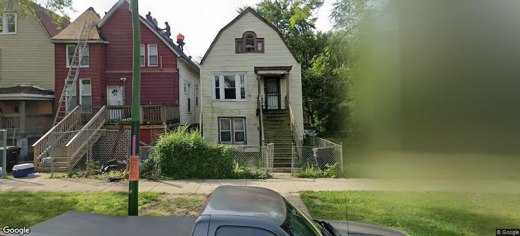627 E 92nd Pl, Chicago, IL 60619 - exterior space with stairway