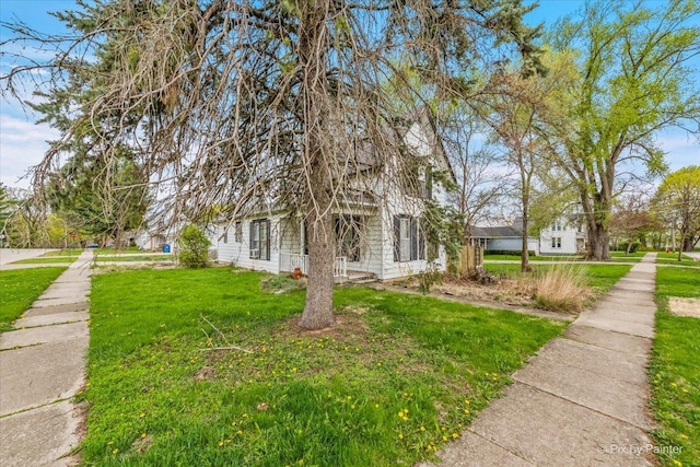 view of home's exterior featuring a yard