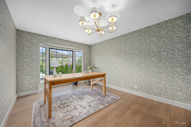 5930 Hillcrest Ct, Downers Grove, IL 60516 - office featuring an inviting chandelier, wood finished floors, visible vents, and wallpapered walls