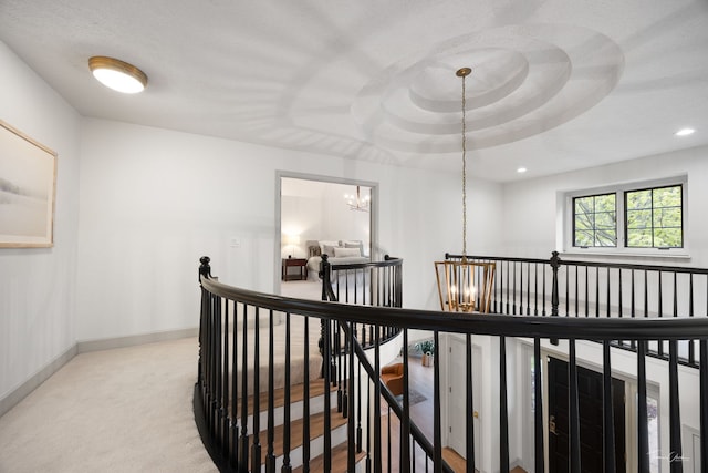 5930 Hillcrest Ct, Downers Grove, IL 60516 - hallway with a chandelier, carpet, recessed lighting, baseboards, and an upstairs landing