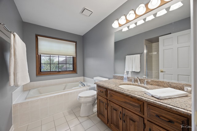 5930 Hillcrest Ct, Downers Grove, IL 60516 - full bathroom with visible vents, a garden tub, vanity, toilet, and tile patterned floors
