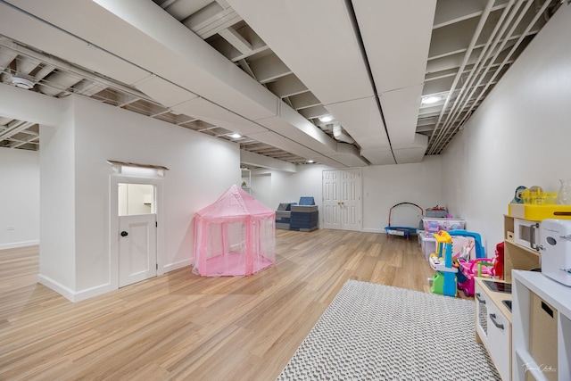 5930 Hillcrest Ct, Downers Grove, IL 60516 - playroom with baseboards and wood finished floors