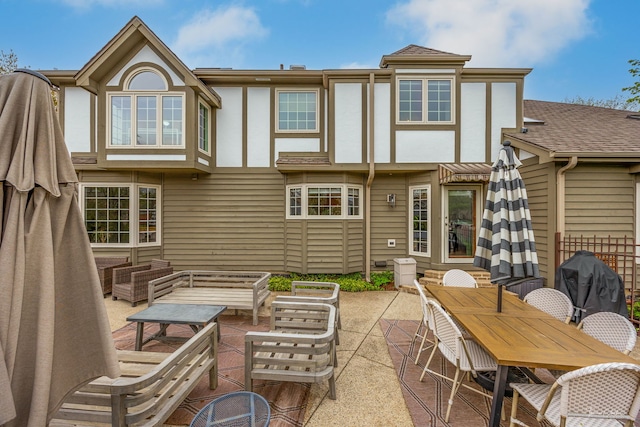 5930 Hillcrest Ct, Downers Grove, IL 60516 - rear view of house featuring a patio, outdoor lounge area, outdoor dining area, and stucco siding