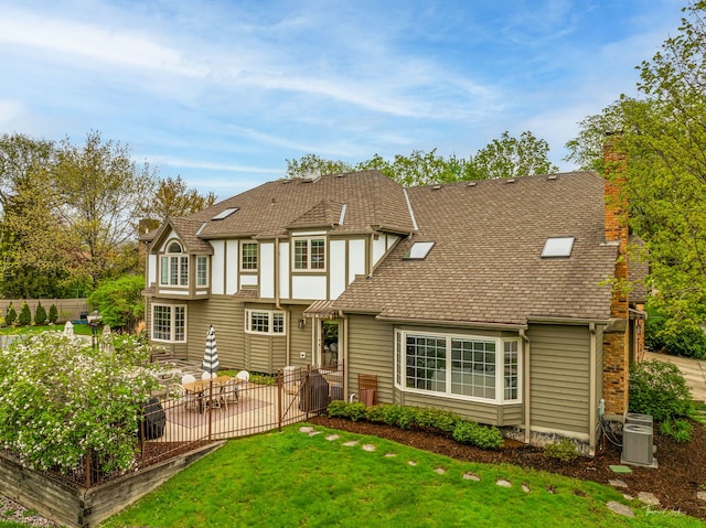 5930 Hillcrest Ct, Downers Grove, IL 60516 - rear view of property with fence, a patio, a chimney, and a yard