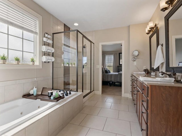 ensuite bathroom featuring tile patterned flooring, vanity, ensuite bath, a tub with jets, and a stall shower