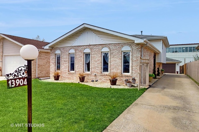 ranch-style house featuring brick siding, fence, and a front lawn