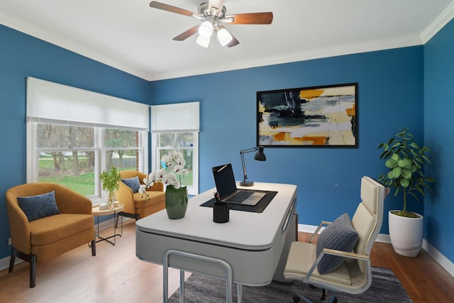 office area with baseboards, wood finished floors, a ceiling fan, and crown molding