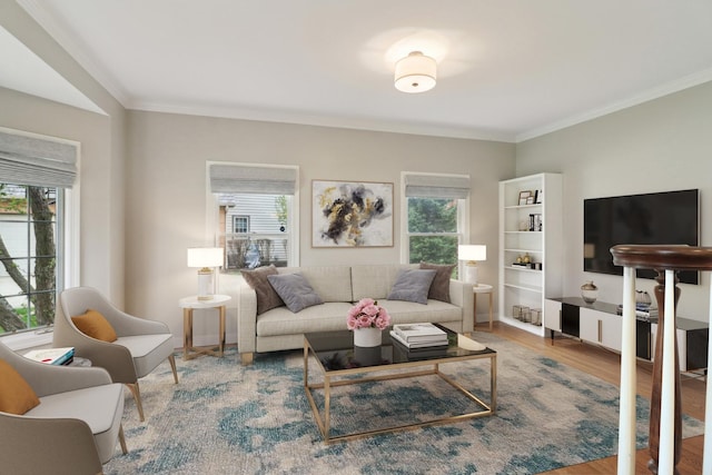 living room with ornamental molding and wood finished floors