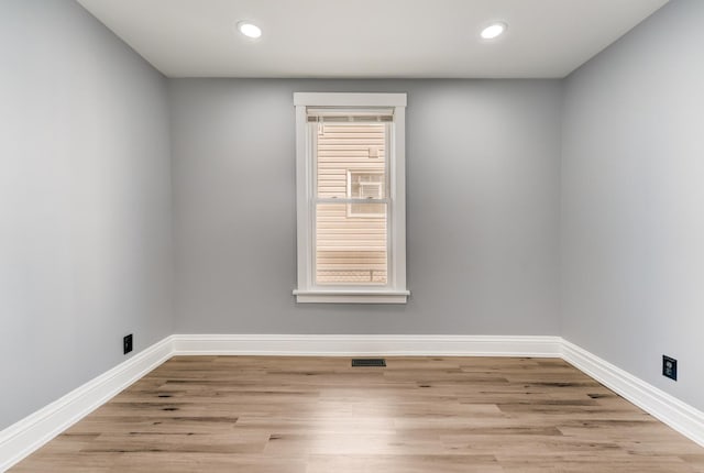 2147 N Latrobe Ave, Chicago, IL 60639 - unfurnished room with recessed lighting, light wood-type flooring, visible vents, and baseboards