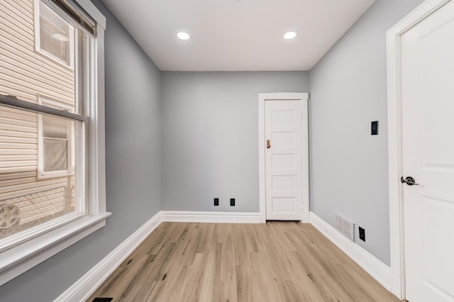 2147 N Latrobe Ave, Chicago, IL 60639 - spare room featuring light wood finished floors, baseboards, recessed lighting, and visible vents