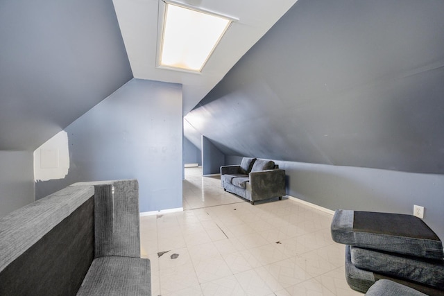 2147 N Latrobe Ave, Chicago, IL 60639 - bedroom with lofted ceiling and baseboards