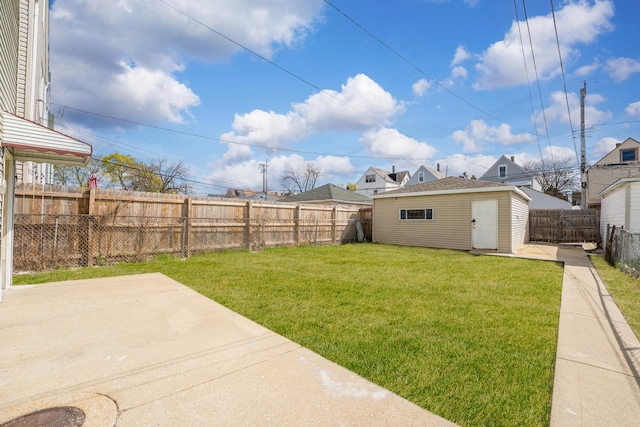 2147 N Latrobe Ave, Chicago, IL 60639 - view of yard featuring a fenced backyard, an outdoor structure, and a patio area